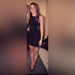 Size 2 Express black mini dress with shear side details